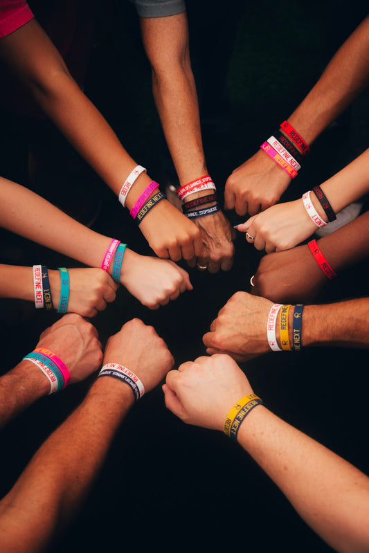 RedFlamingo “Redefine Next” Wristband